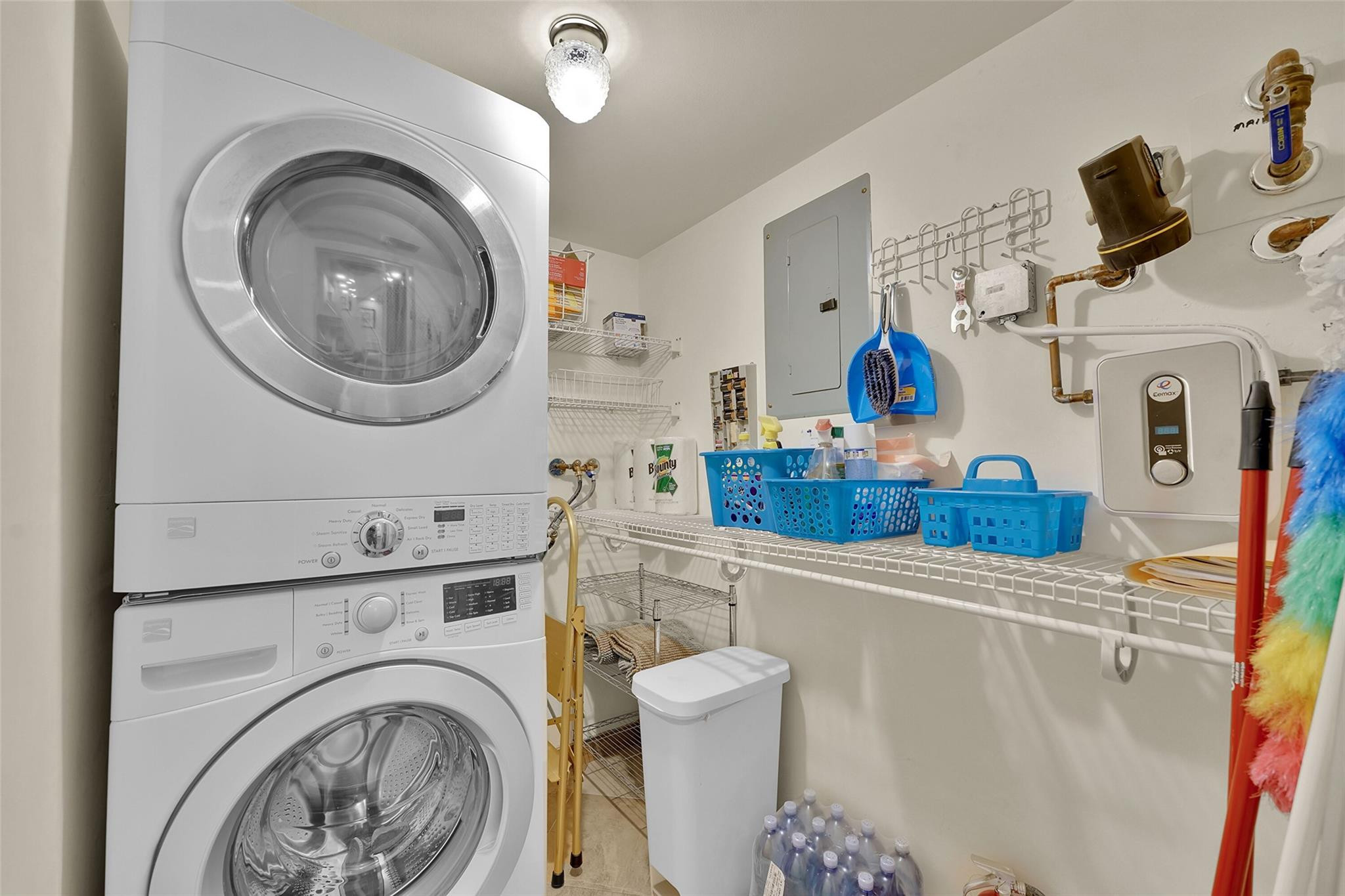 5340 Northwest 2nd Avenue, Unit PH26 Boca Raton, FL 33487 - Photo 7 of 53 a room with furniture a washer and dryer