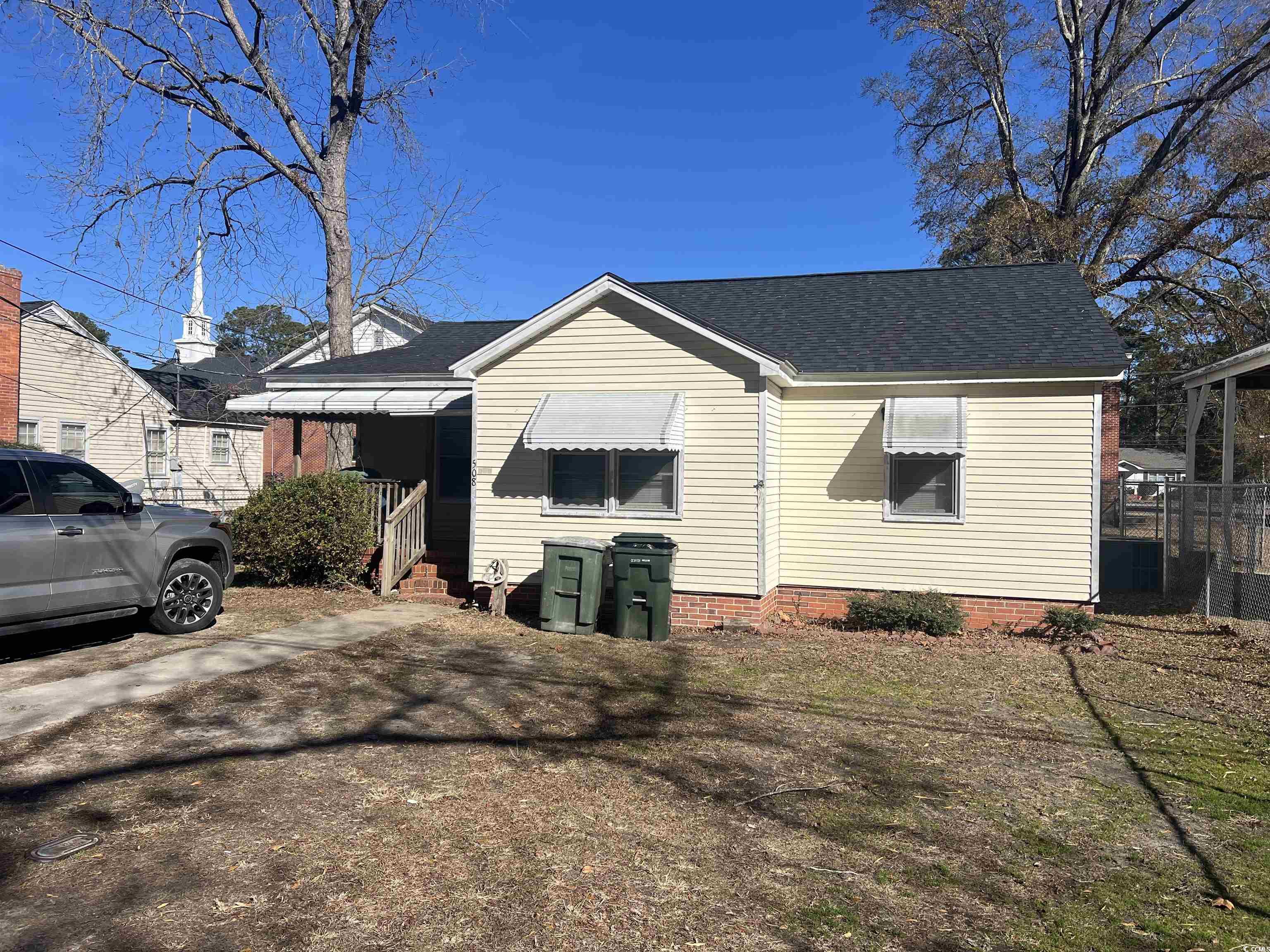 508 Sycamore Street Conway, SC 29527 - Photo 10 of 11 View of property exterior featuring a shingled roof