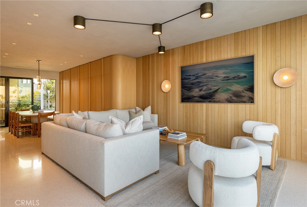 2910 Lafayette Avenue Newport Beach, CA 92663 - Photo 52 of 60 a living room with furniture and a large window