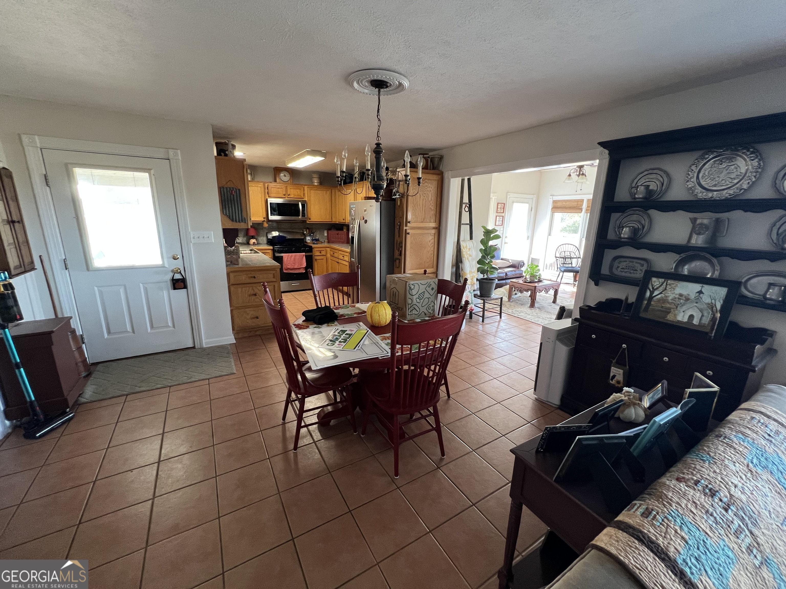 1512 Buckeye Road East Dublin, GA 31027 - Photo 13 of 45 a living room with furniture and a window
