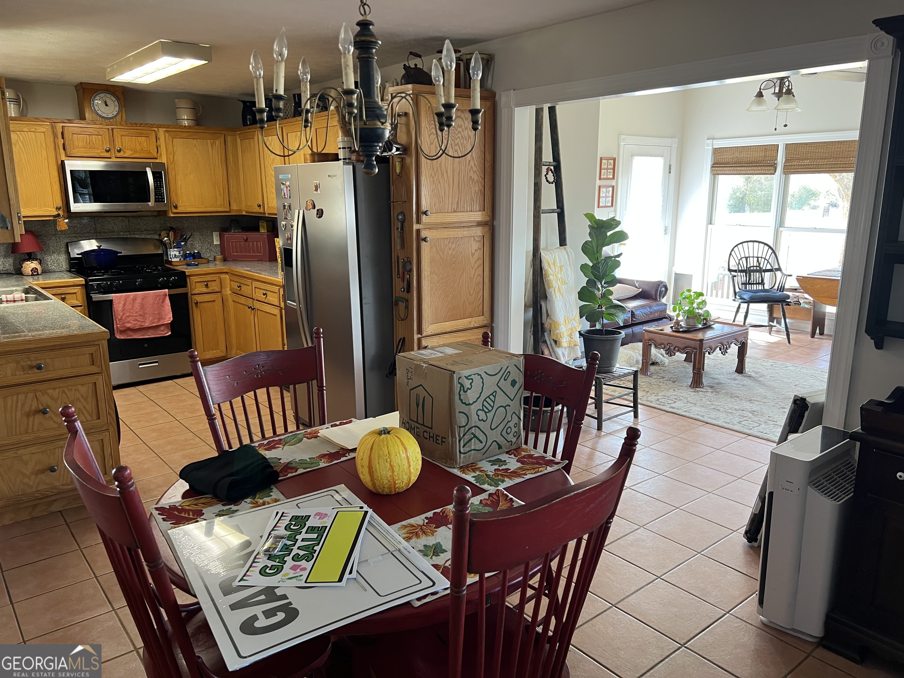 1512 Buckeye Road East Dublin, GA 31027 - Photo 26 of 45 a living room with furniture and a flat screen tv