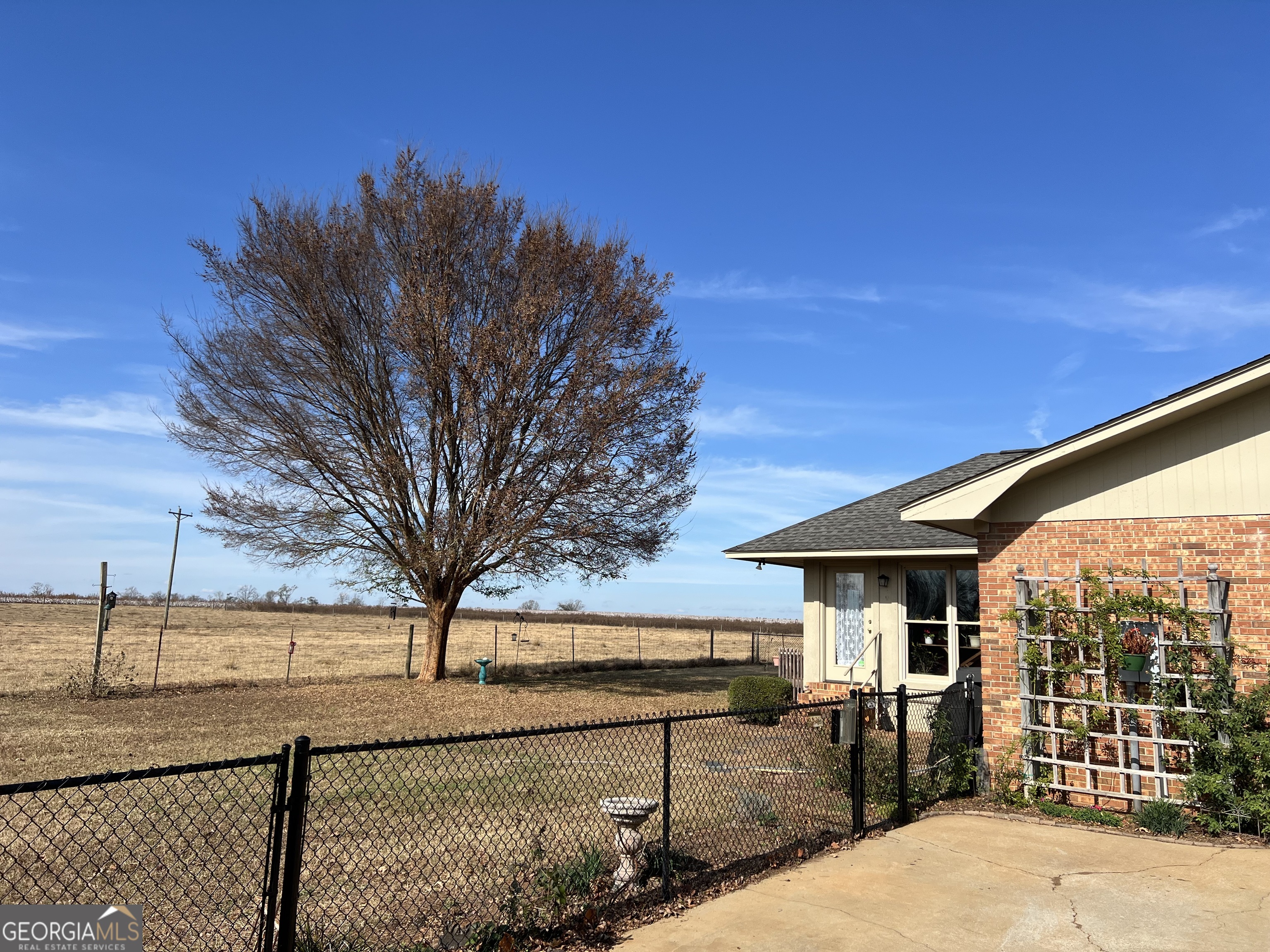 1512 Buckeye Road East Dublin, GA 31027 - Photo 32 of 45 a view of a house with a outdoor space