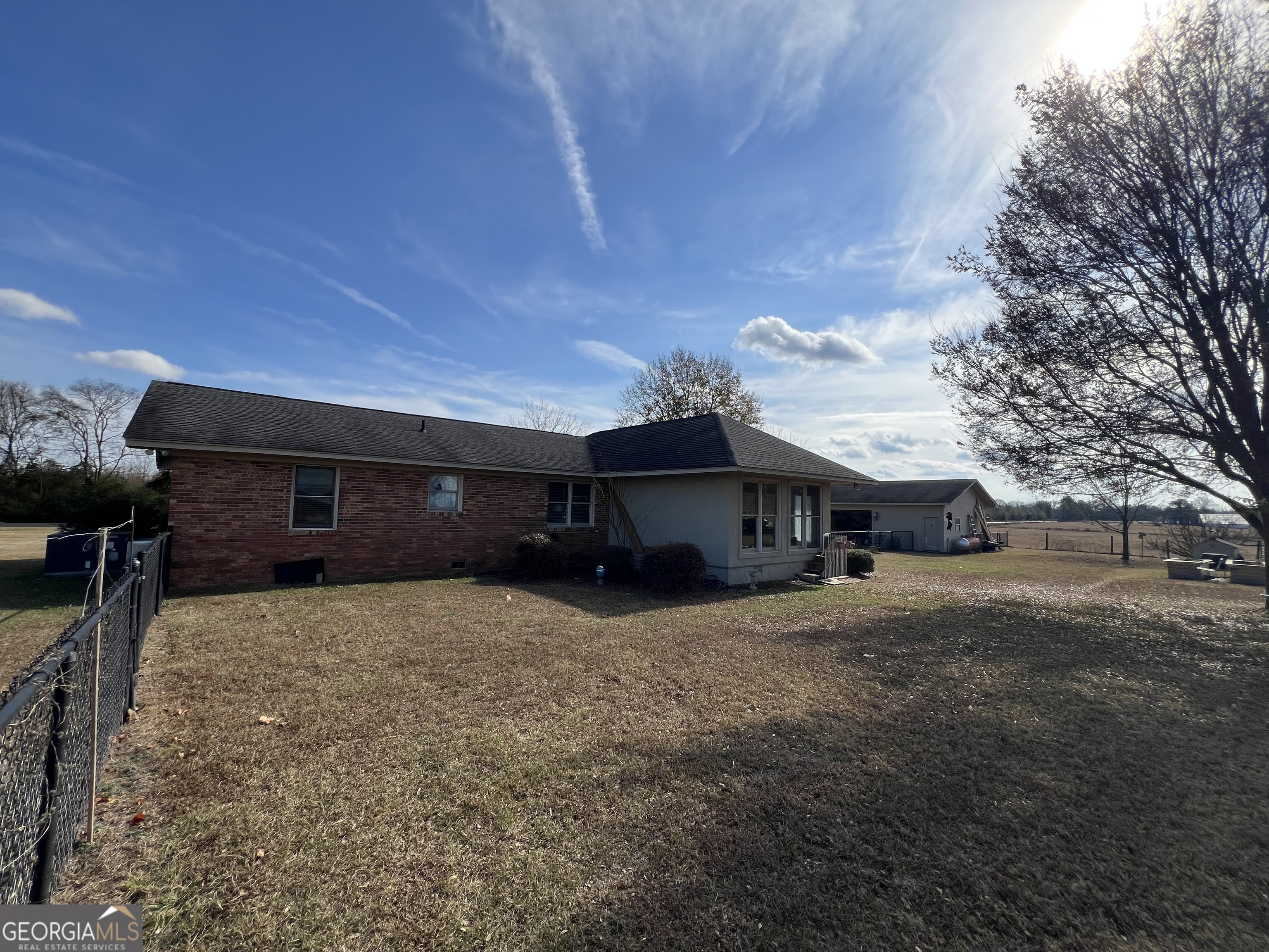 1512 Buckeye Road East Dublin, GA 31027 - Photo 36 of 45 a front view of a house with a yard