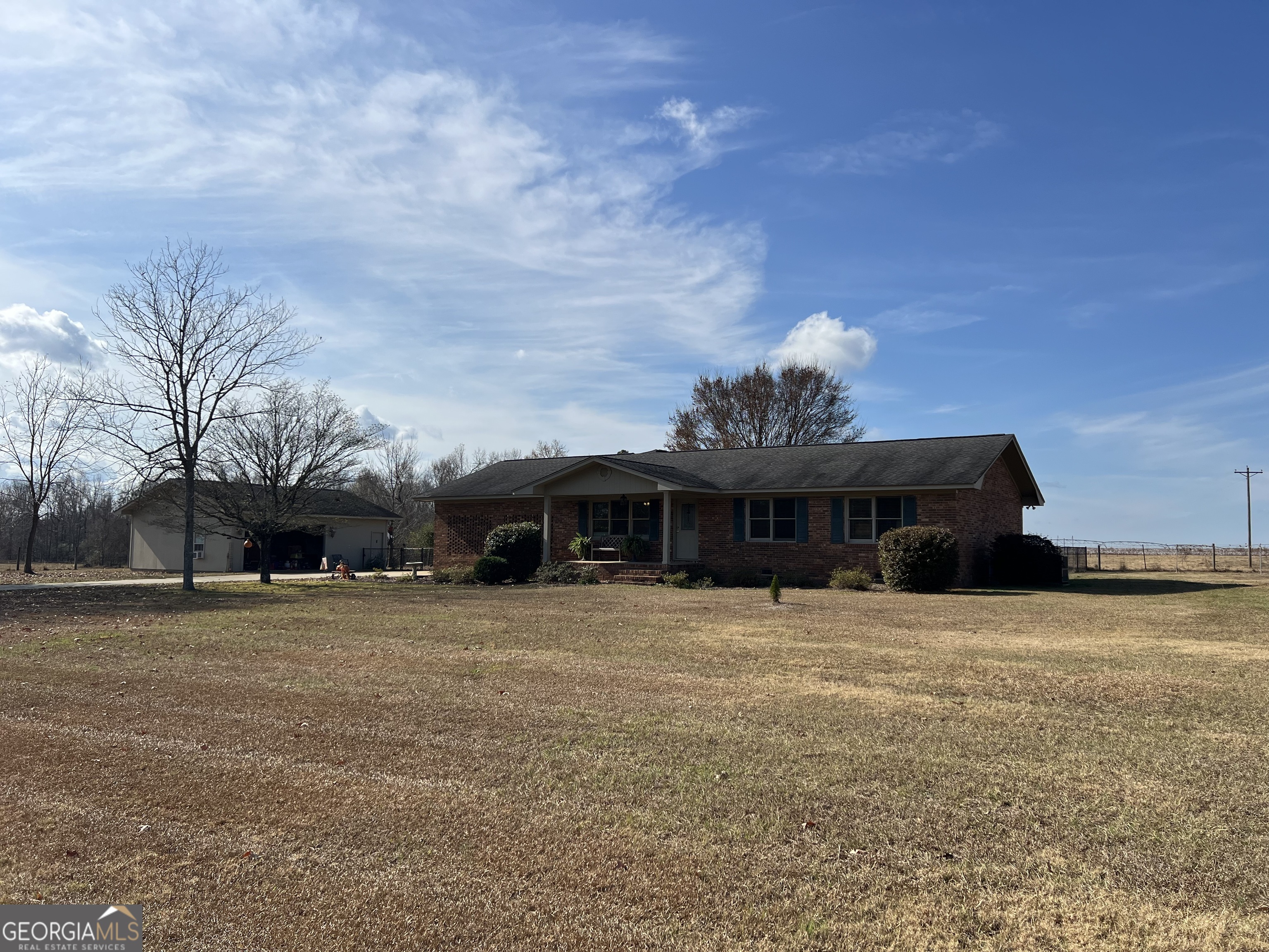 1512 Buckeye Road East Dublin, GA 31027 - Photo 4 of 45 a front view of a house with a yard