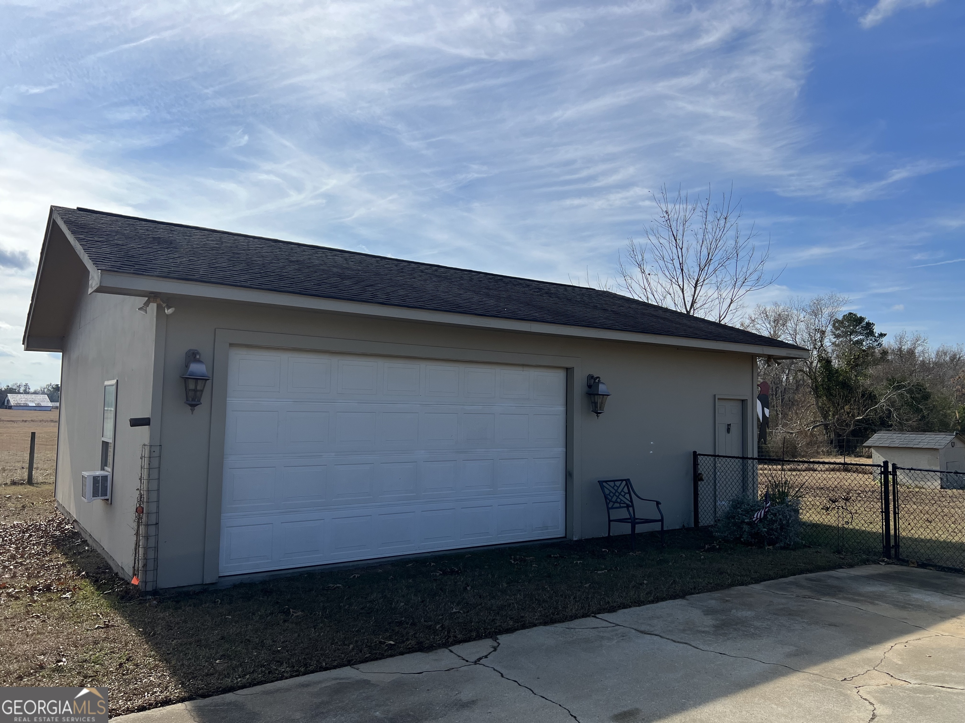 1512 Buckeye Road East Dublin, GA 31027 - Photo 43 of 45 a backyard of a house with lots of green space