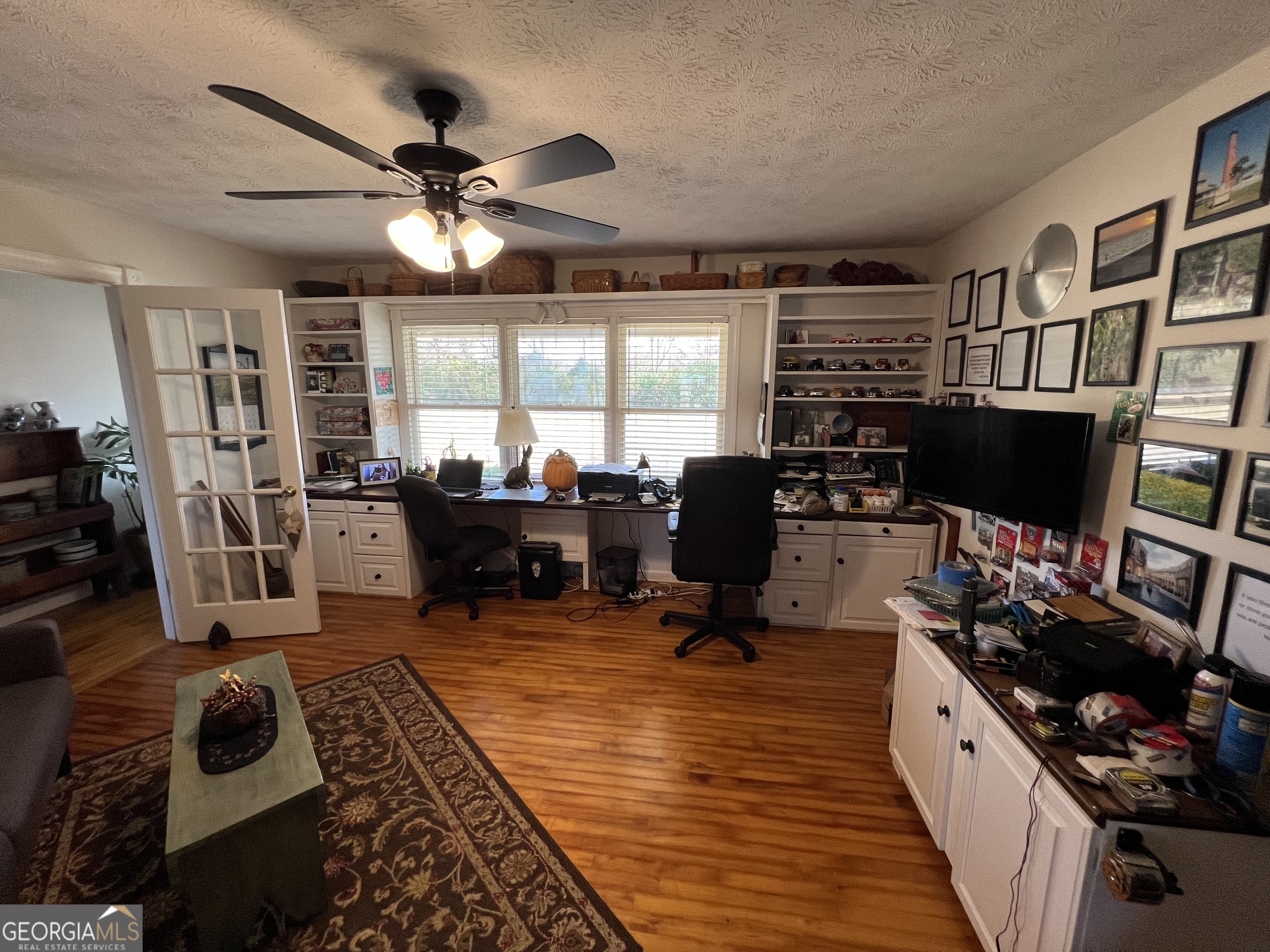 1512 Buckeye Road East Dublin, GA 31027 - Photo 9 of 45 a living room with furniture fireplace and flat screen tv