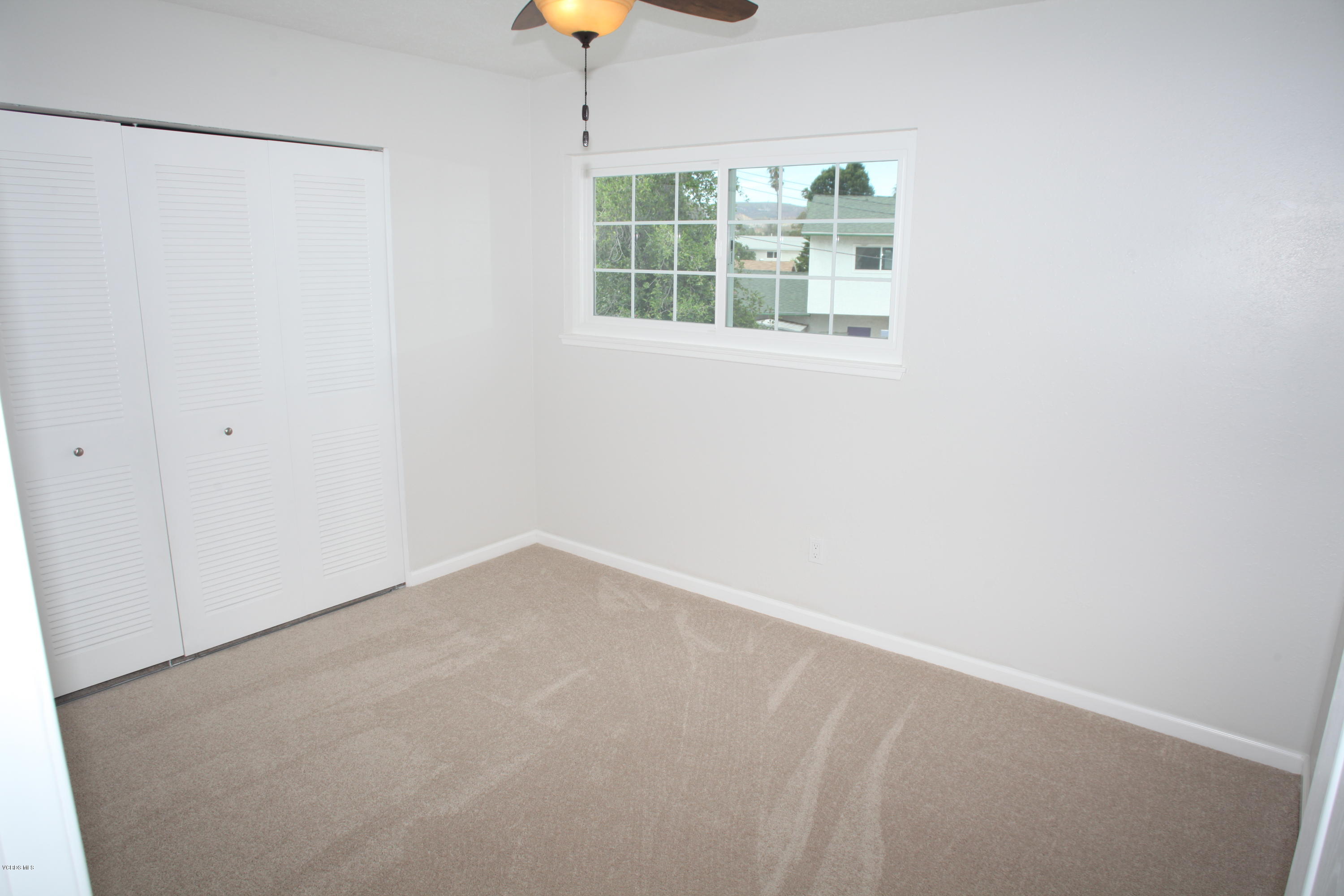 2061 Rhoda Street Simi Valley, CA 93065 - Photo 19 of 27 a view of an empty room with a window