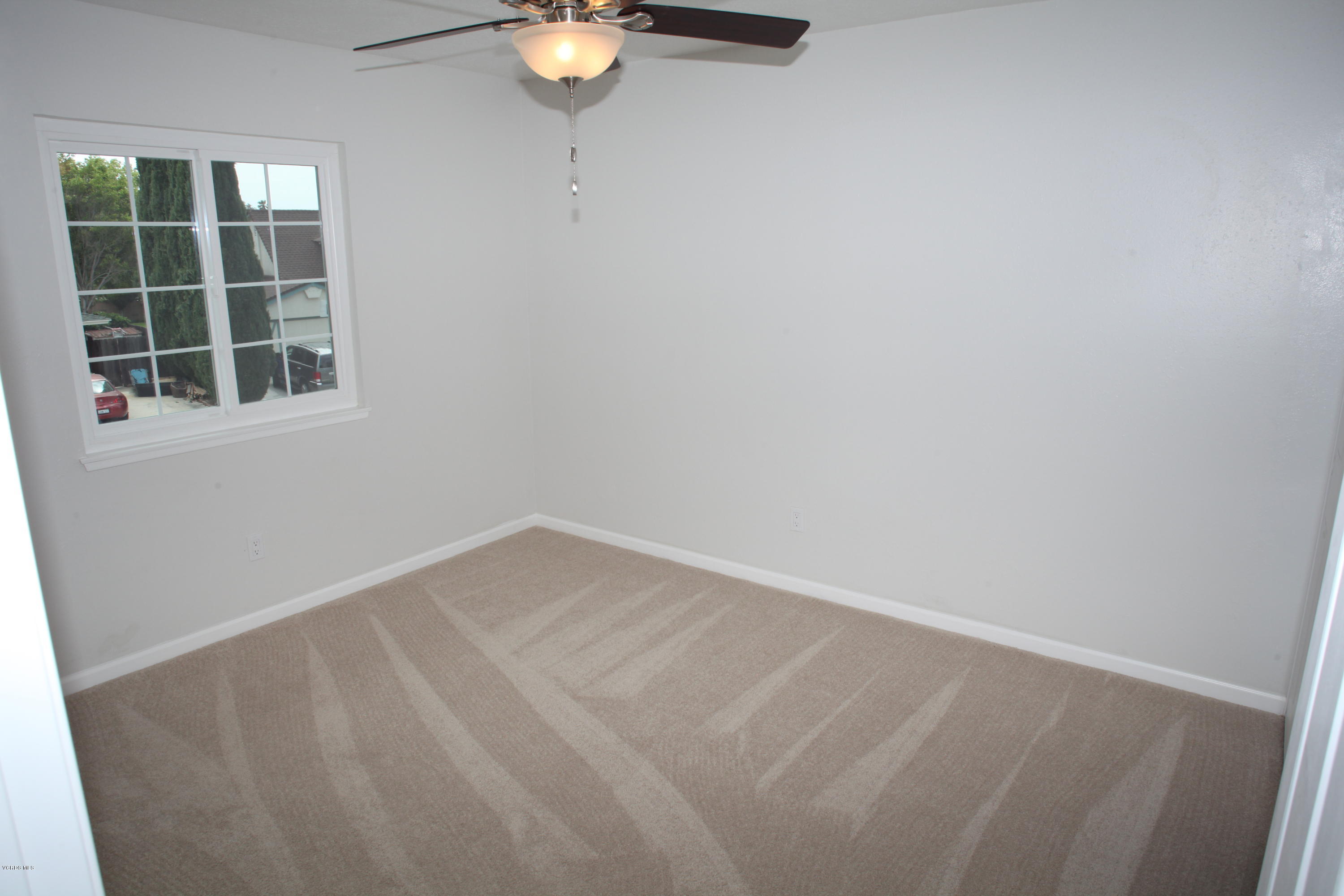 2061 Rhoda Street Simi Valley, CA 93065 - Photo 20 of 27 a view of an empty room with a window