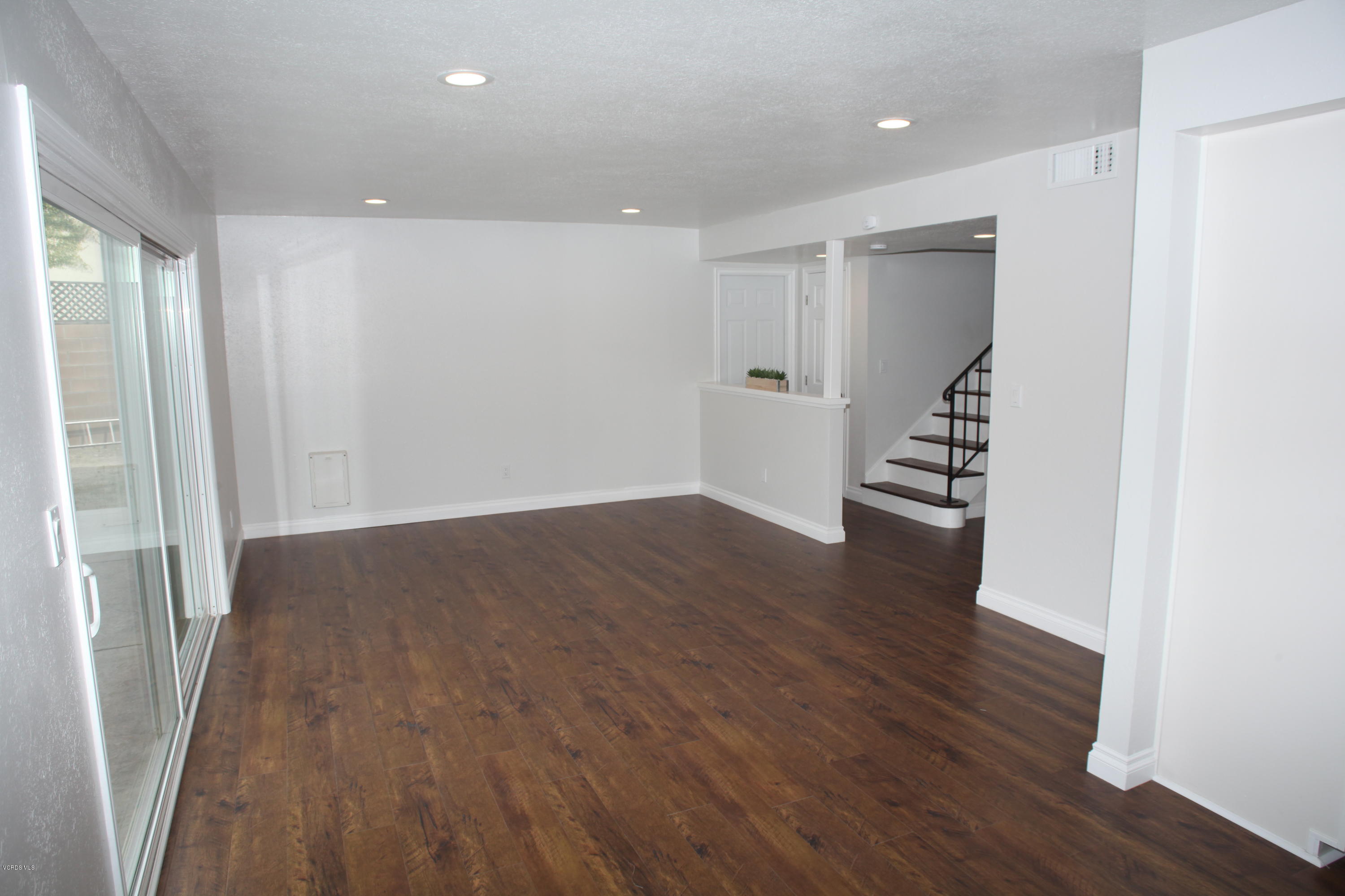 2061 Rhoda Street Simi Valley, CA 93065 - Photo 5 of 27 wooden floor in an empty room with a window