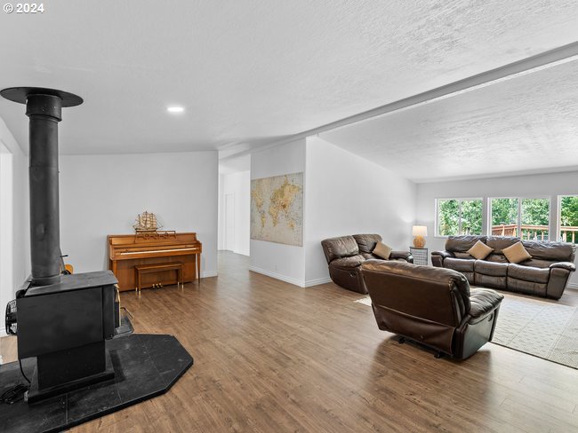 32204 Northeast 94th Street Camas, WA 98607 - Photo 3 of 35 a living room with furniture and a window