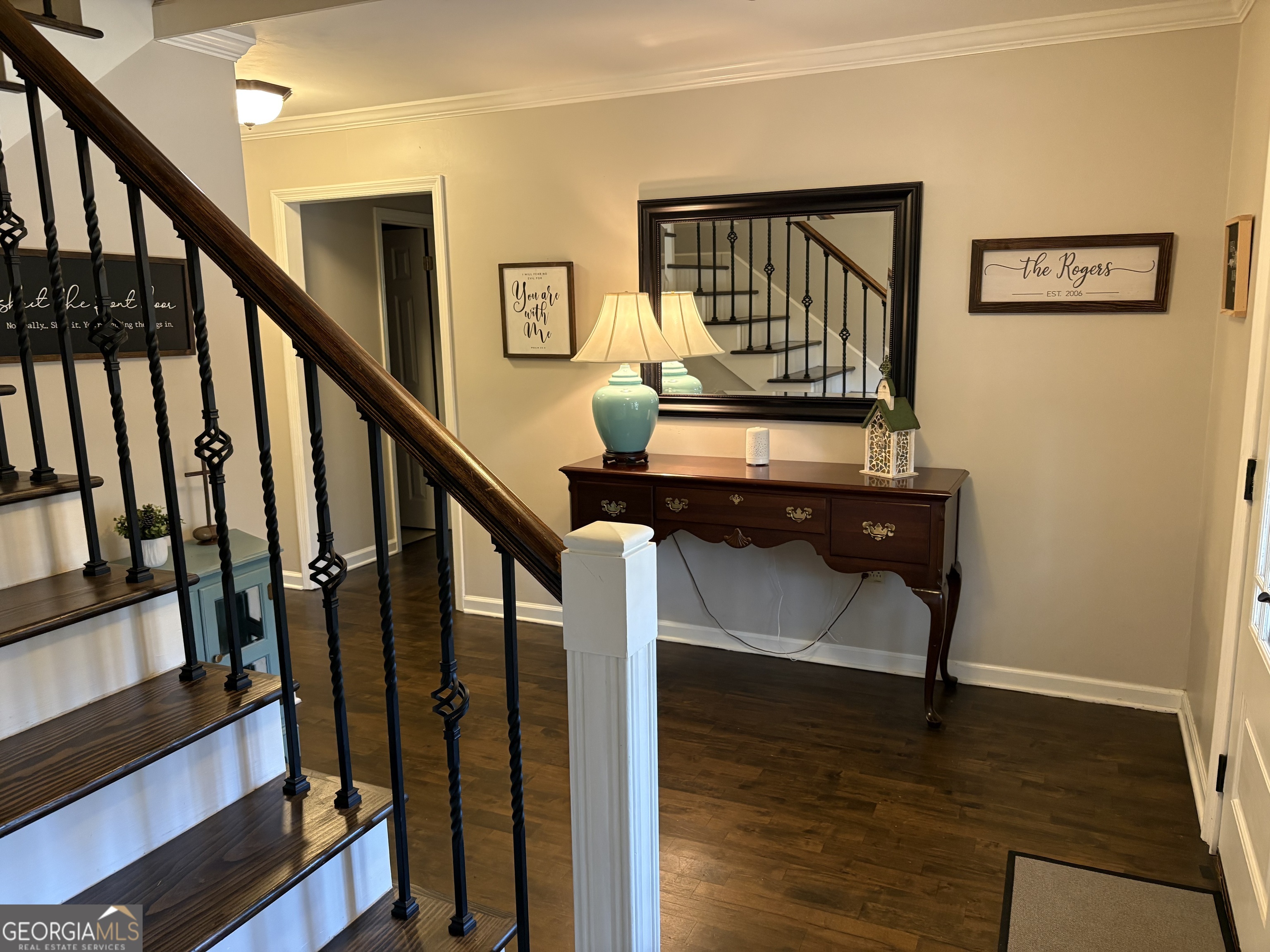 502 Payne Place Dublin, GA 31021 - Photo 11 of 61 a view of entryway with wooden floor and stairs