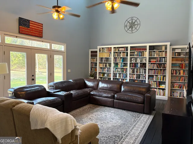 a view of a bathroom with a shower and a window