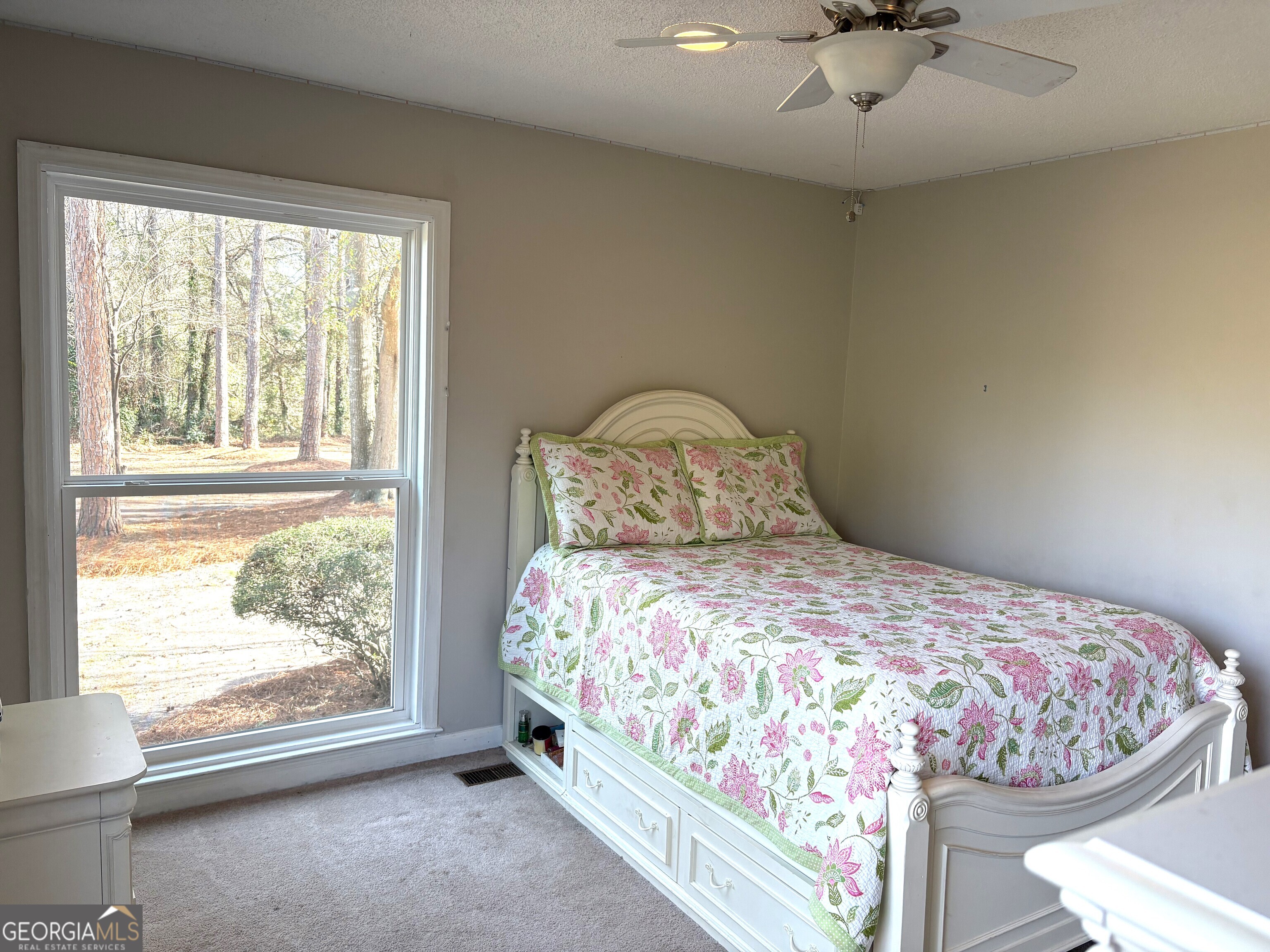 502 Payne Place Dublin, GA 31021 - Photo 38 of 61 a bedroom with a bed and window