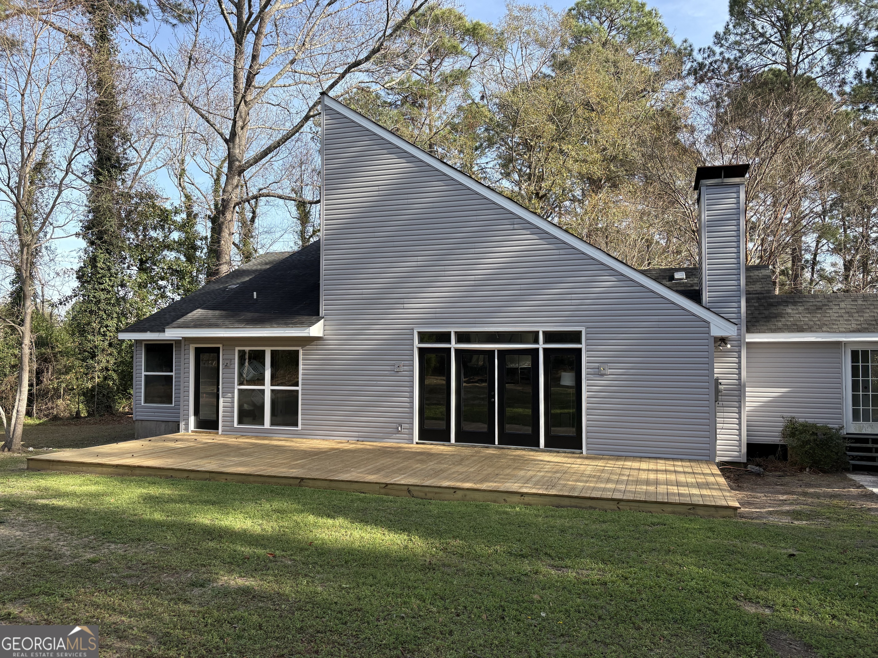 502 Payne Place Dublin, GA 31021 - Photo 57 of 61 a house that has a tree in front of it