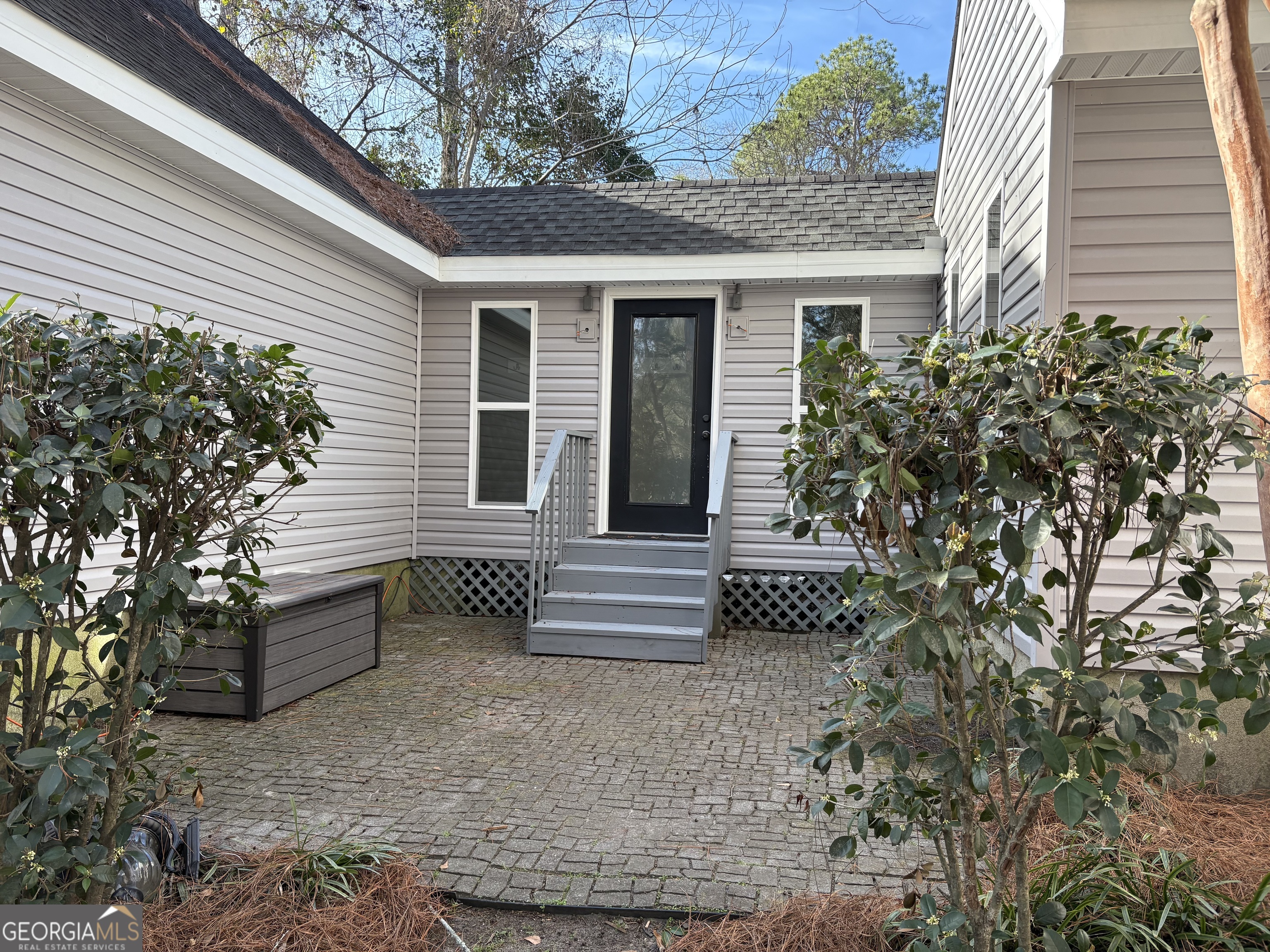 502 Payne Place Dublin, GA 31021 - Photo 58 of 61 a front view of a house with a garden