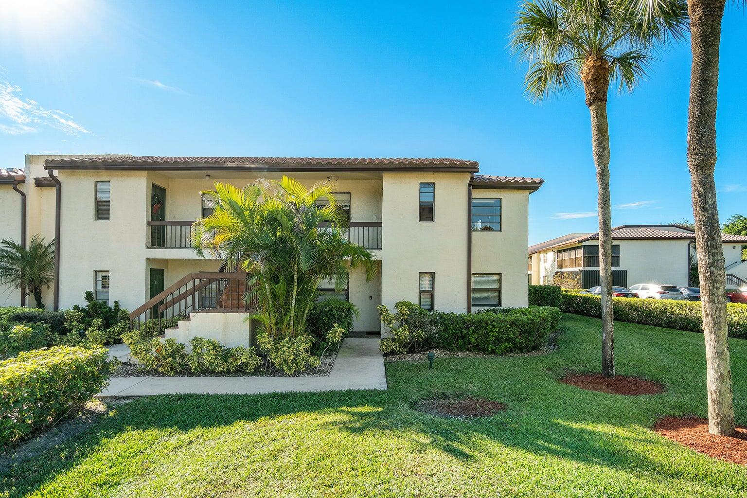 21863 Arriba Real, Unit 8K Boca Raton, FL 33433 - Photo 3 of 26 FRONT VIEW