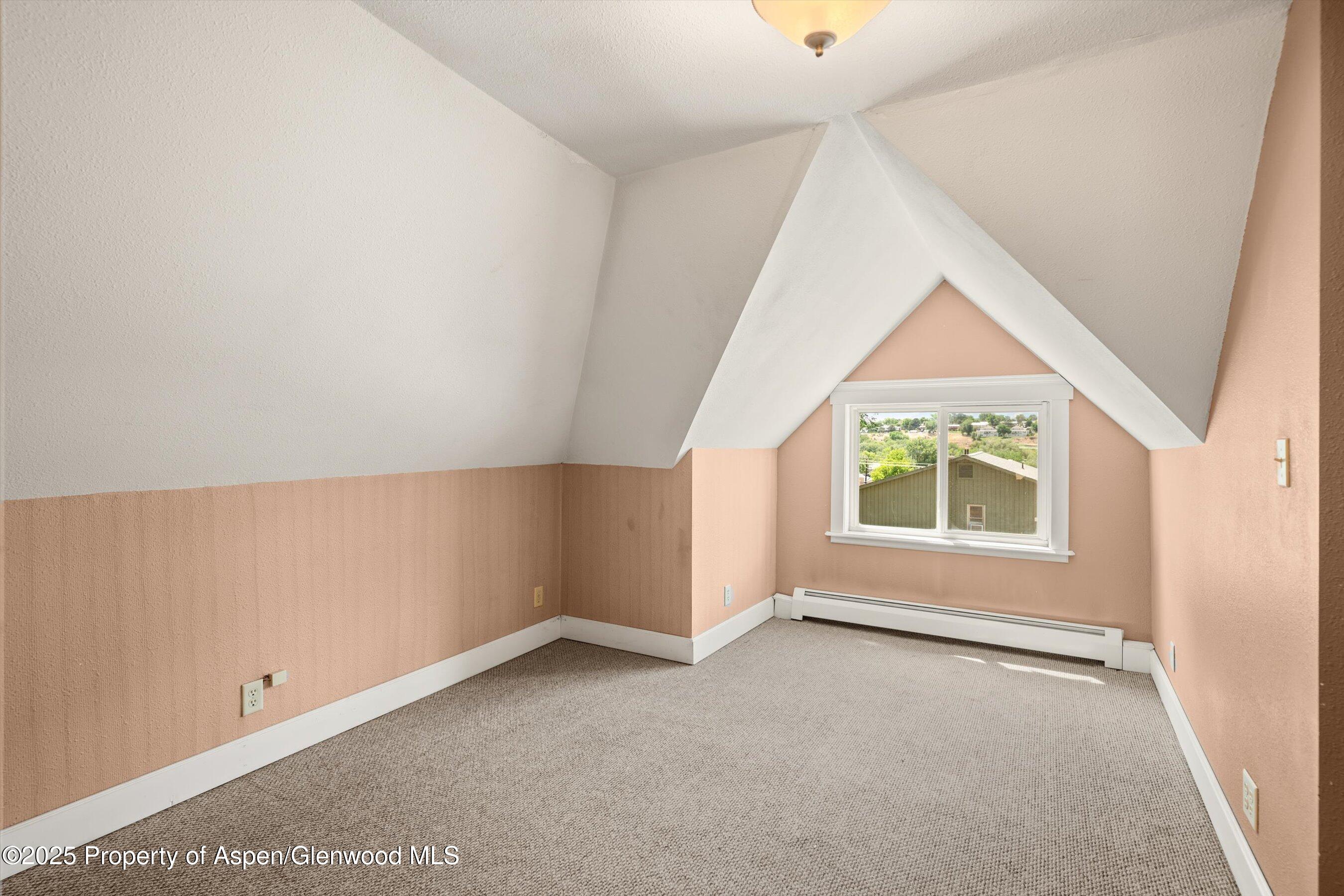 440 Whiteriver Avenue Rifle, CO 81650 - Photo 14 of 25 an empty room with windows