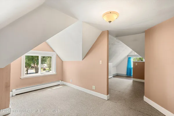 a view of a living room with windows