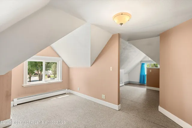 a view of a living room with windows