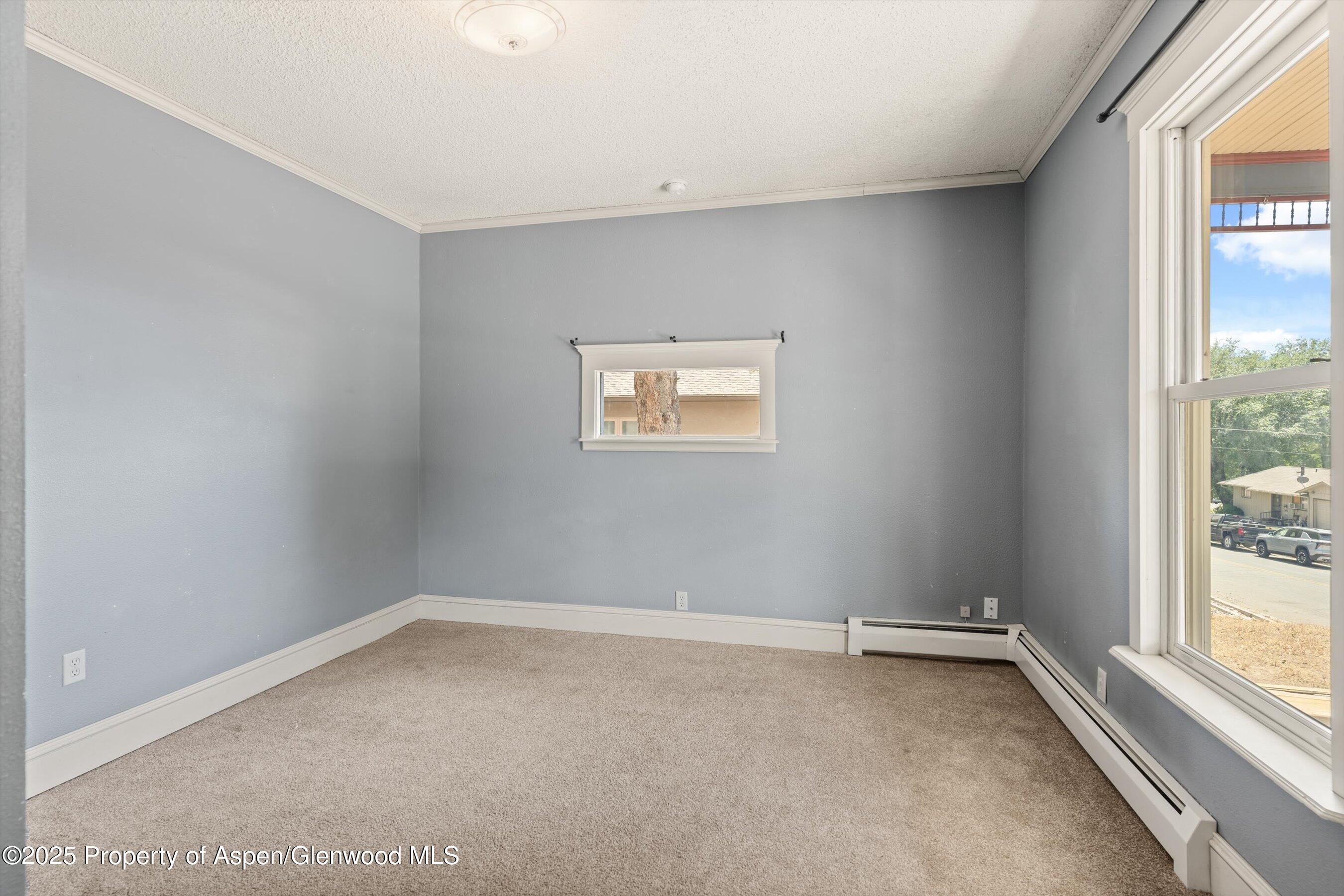 440 Whiteriver Avenue Rifle, CO 81650 - Photo 18 of 25 an empty room with a window
