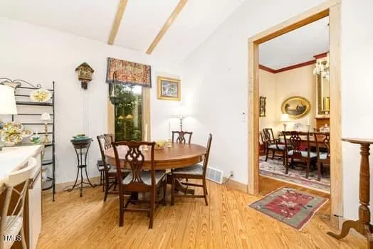 a kitchen with a stove and a refrigerator