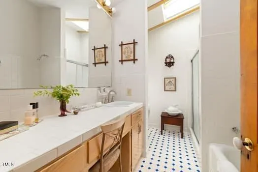 a kitchen with a sink and a stove top oven