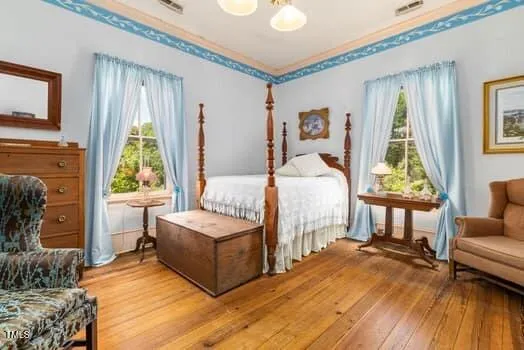 a view of a wooden deck with a yard