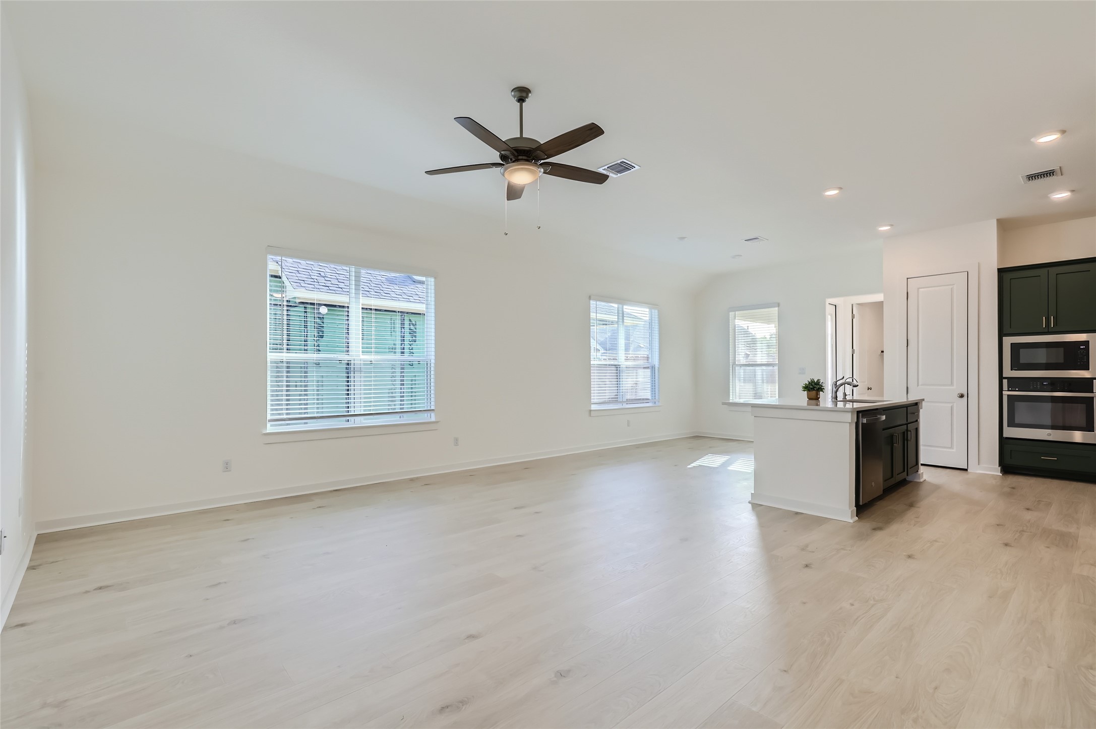 100 Cherry Sage Cove Georgetown, TX 78628 - Photo 3 of 14 a view of a kitchen with furniture and windows