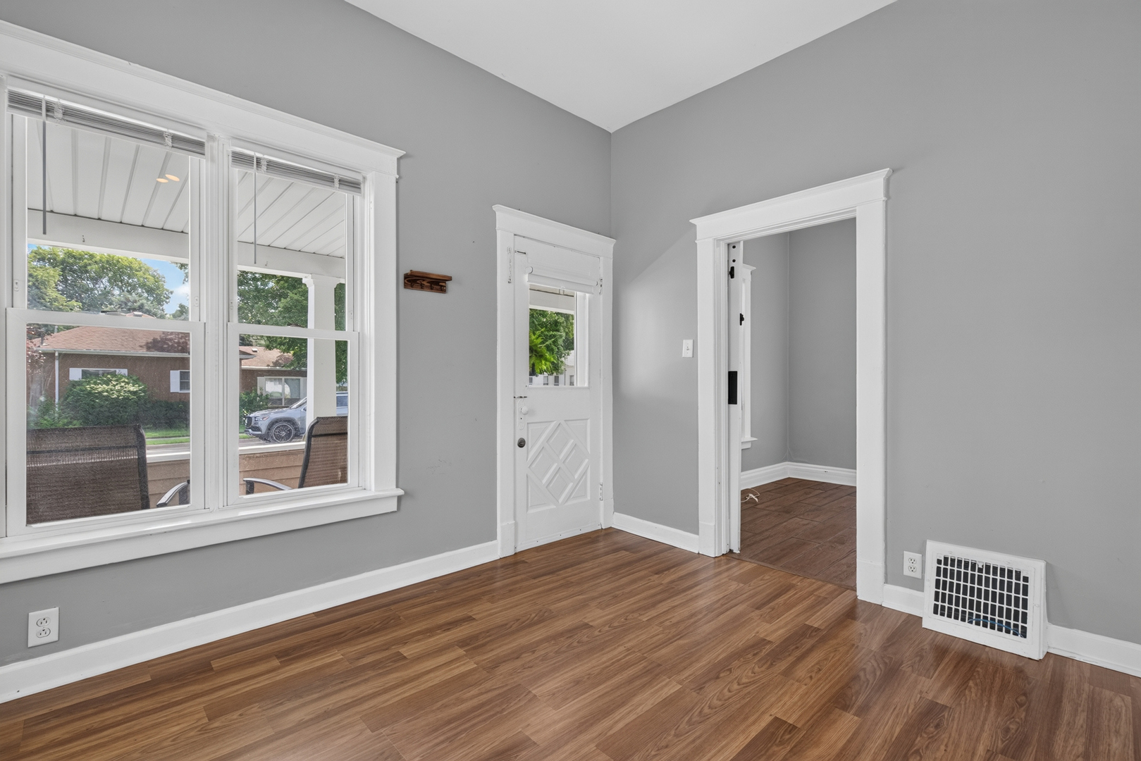 1128 Butler Street Morris, IL 60450 - Photo 5 of 28 a view of empty room with wooden floor and fan