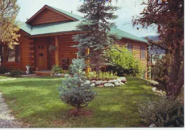 530 Original Road Basalt, CO 81621 - Photo 1 of 3 a view of a house with a yard and plants