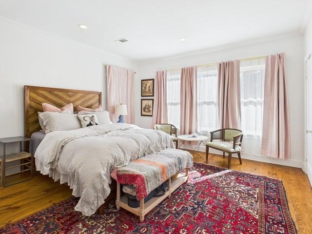 226 South Pinkerton Street Athens, TX 75751 - Photo 14 of 35 a bedroom with a bed and a couch