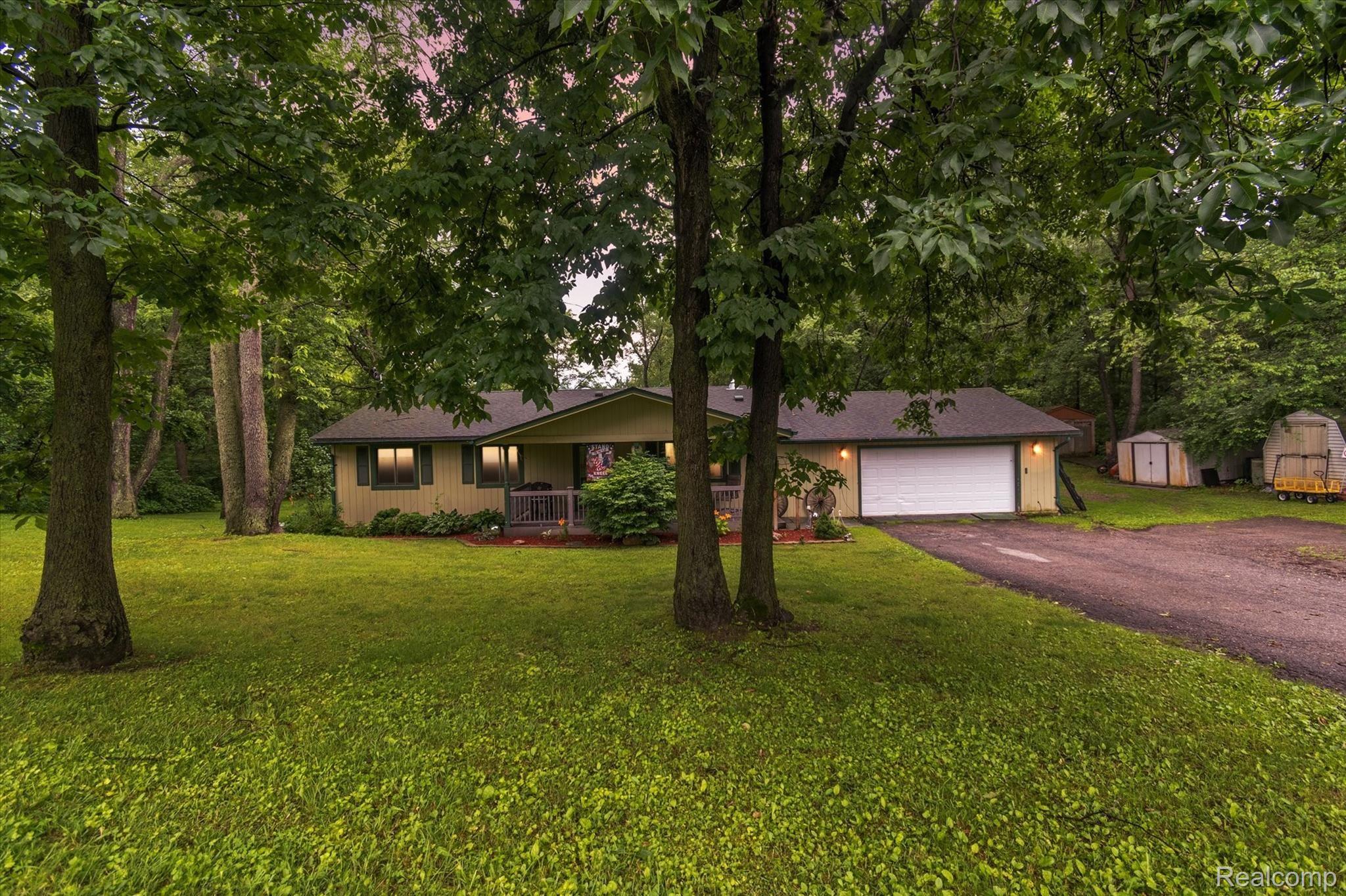 1930 East Coon Lake Road Howell, MI 48843 - Photo 1 of 51 House sits back off the road