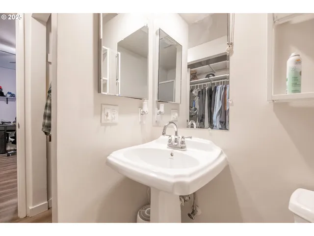 a room with furniture and wooden floor