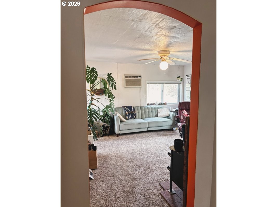 102 Idaho Street Mosier, OR 97040 - Photo 28 of 32 a view of a living room with a large window