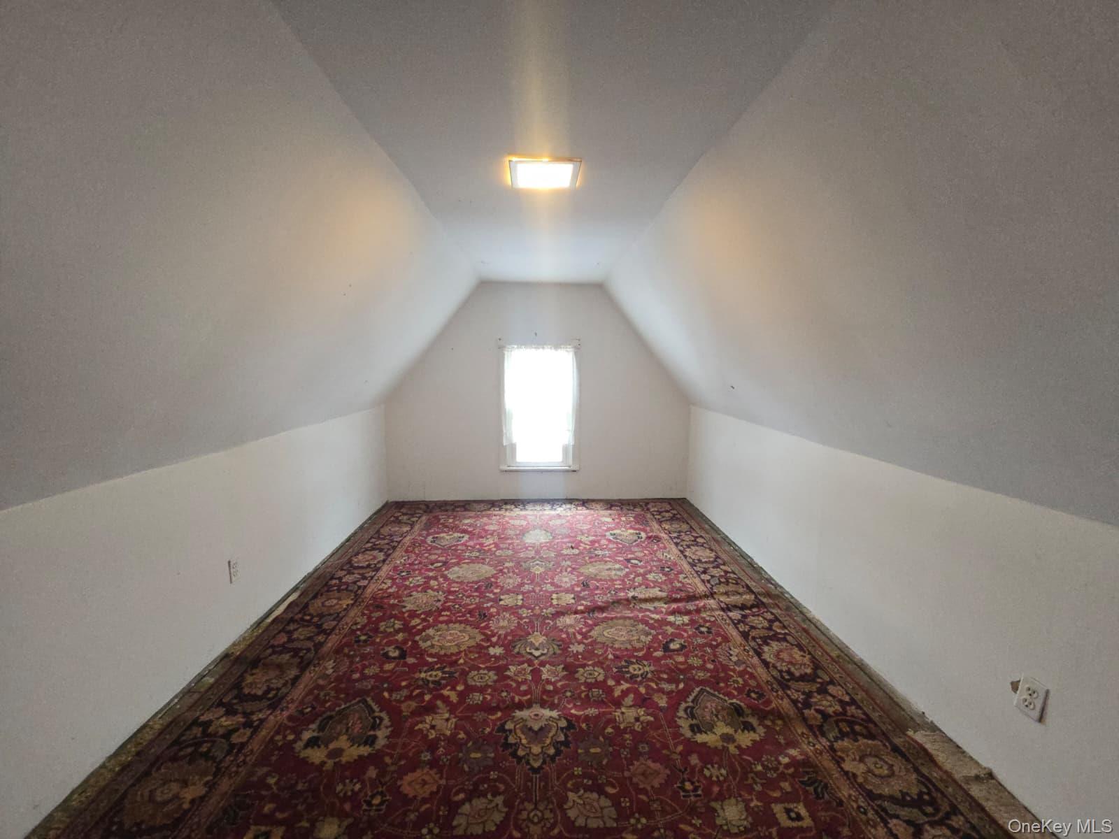 59 Bridge Street, Unit 2 Wallkill, NY 12589 - Photo 12 of 14 Bonus room featuring vaulted ceiling