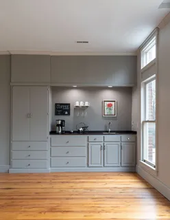 a bed room with a bed and a fireplace