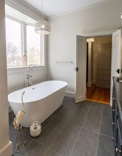 a view of a bedroom with furniture and staircase