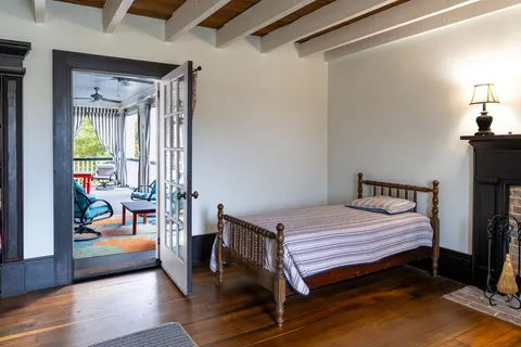 a view of a patio with a chairs and table