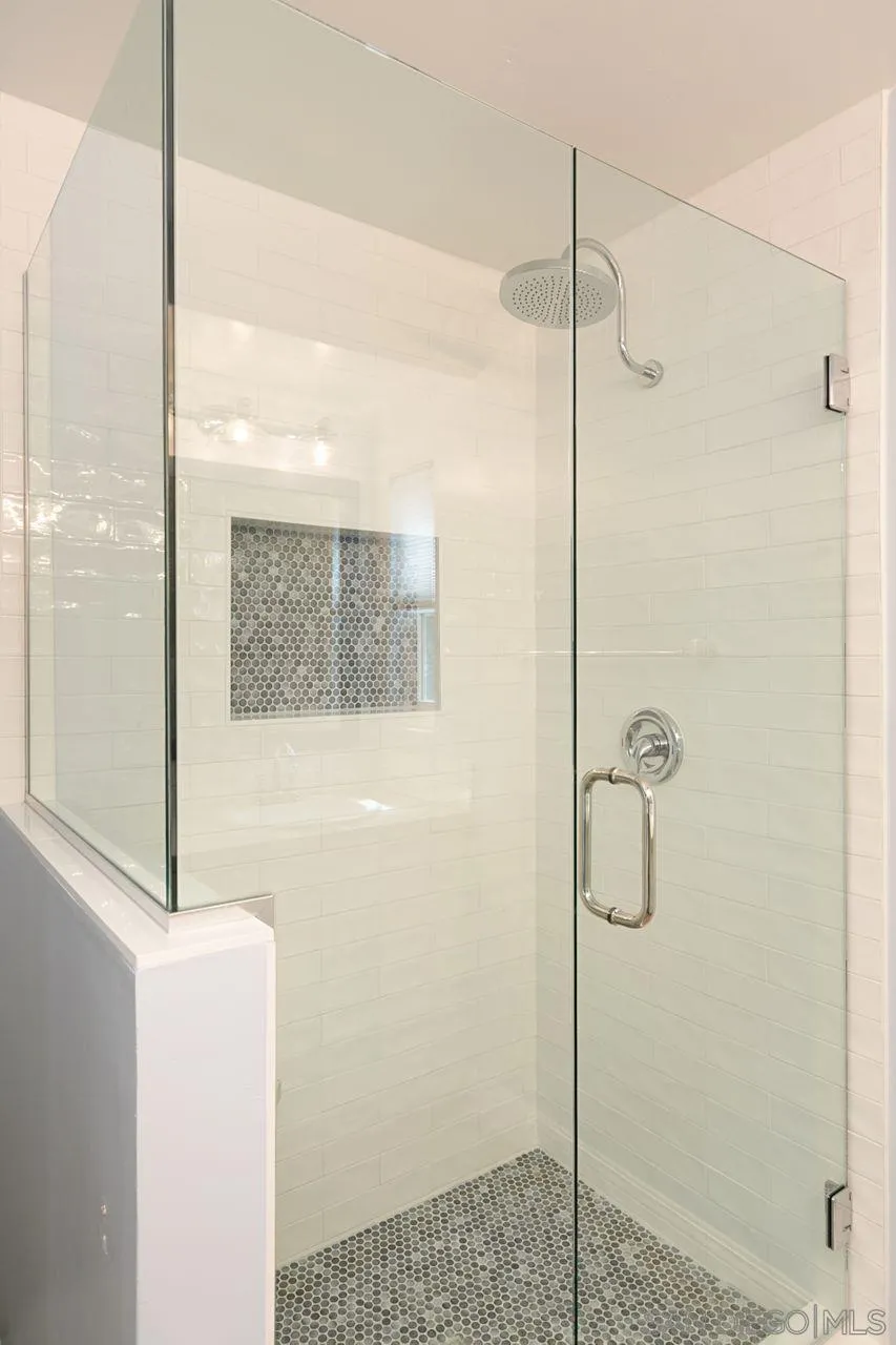 946 Alyssum Road Carlsbad, CA 92011 - Photo 13 of 19 a bathroom with a shower
