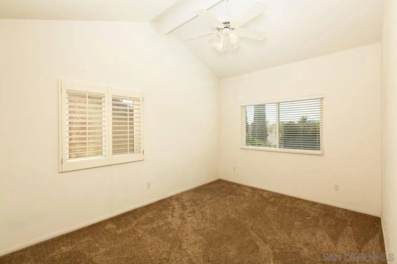 946 Alyssum Road Carlsbad, CA 92011 - Photo 14 of 19 a view of an empty room with a window