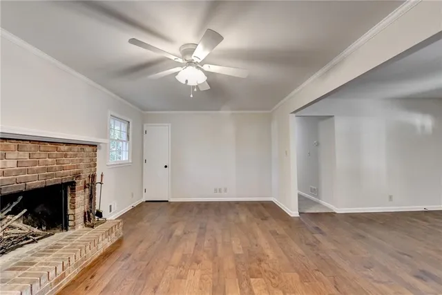 a living room with granite countertop a fireplace