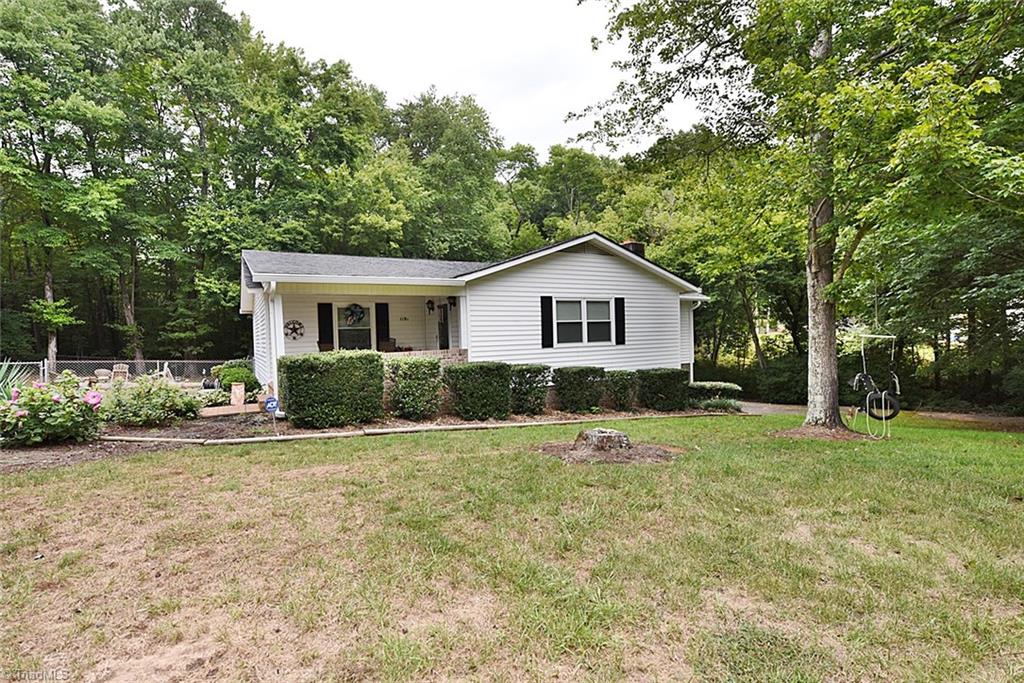 1191 Pullman Drive Rural Hall, NC 27045 - Photo 2 of 23 front of house showing left side landscaping
