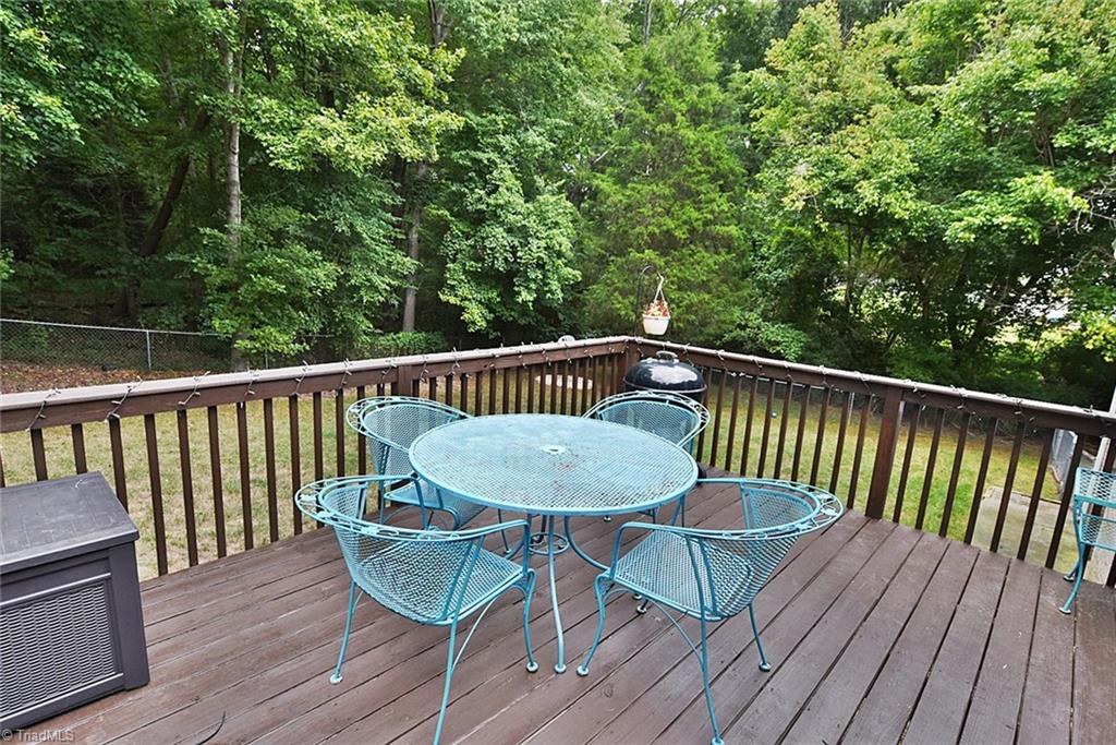 1191 Pullman Drive Rural Hall, NC 27045 - Photo 5 of 23 view of one side of deck overlooking wooded area