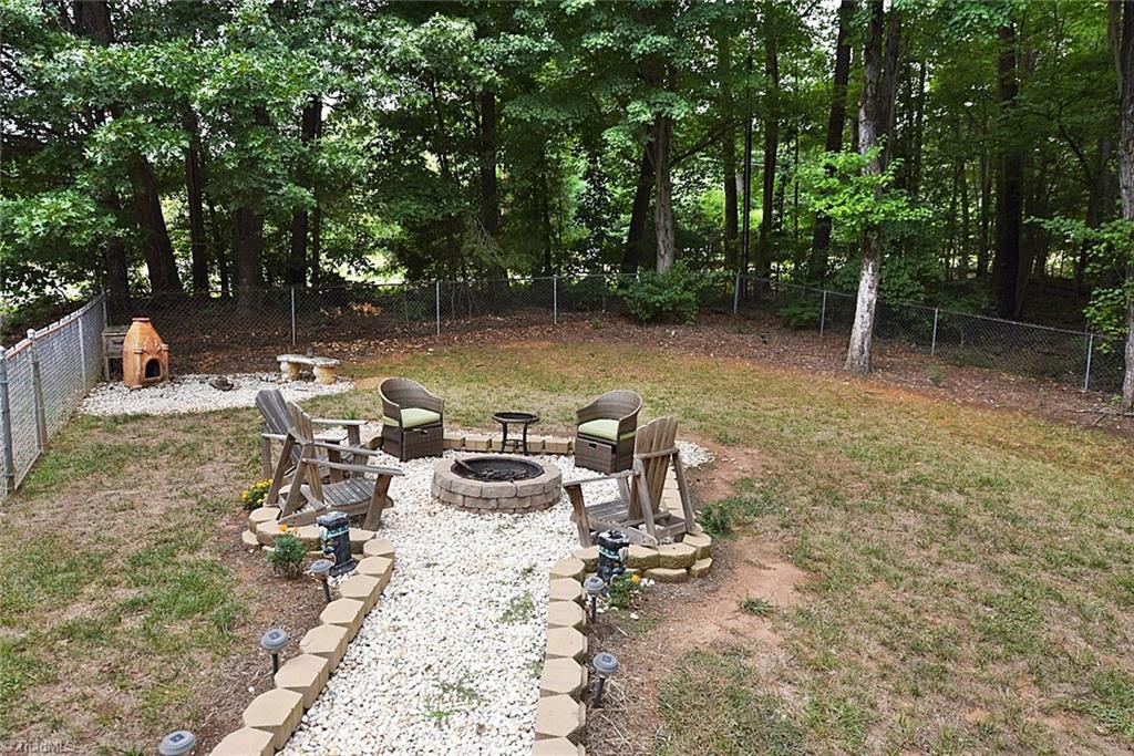 1191 Pullman Drive Rural Hall, NC 27045 - Photo 6 of 23 Bring your guests and enjoy the outdoor sitting around fire pit
