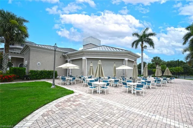 a view of outdoor sitting space with furniture