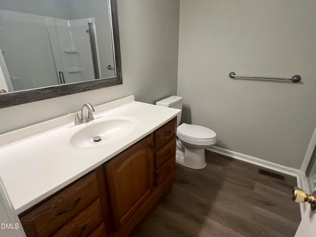 a bathroom with a sink and a toilet