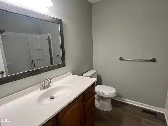 a bathroom with a sink and a toilet
