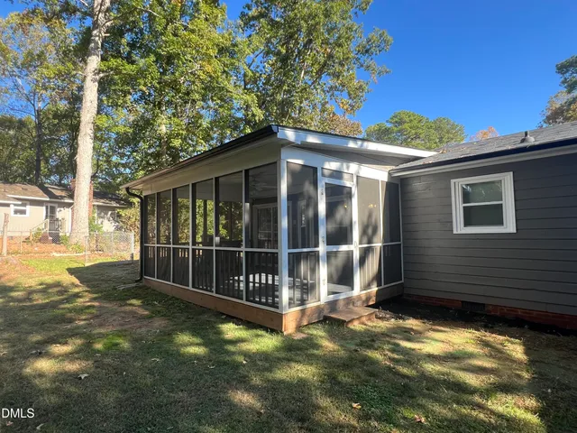 a view of a porch with a yard