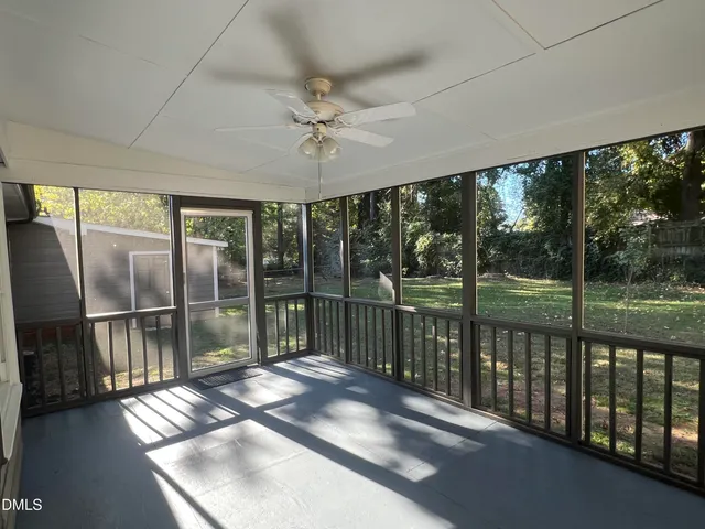 a view of a balcony with furniture