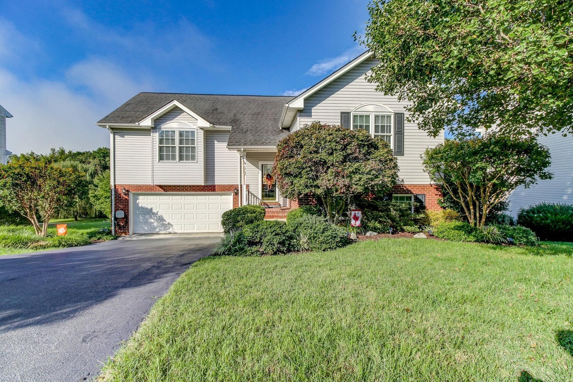 1737 Meadows Road Vinton, VA 24179 - Photo 1 of 37 a front view of a house with a yard